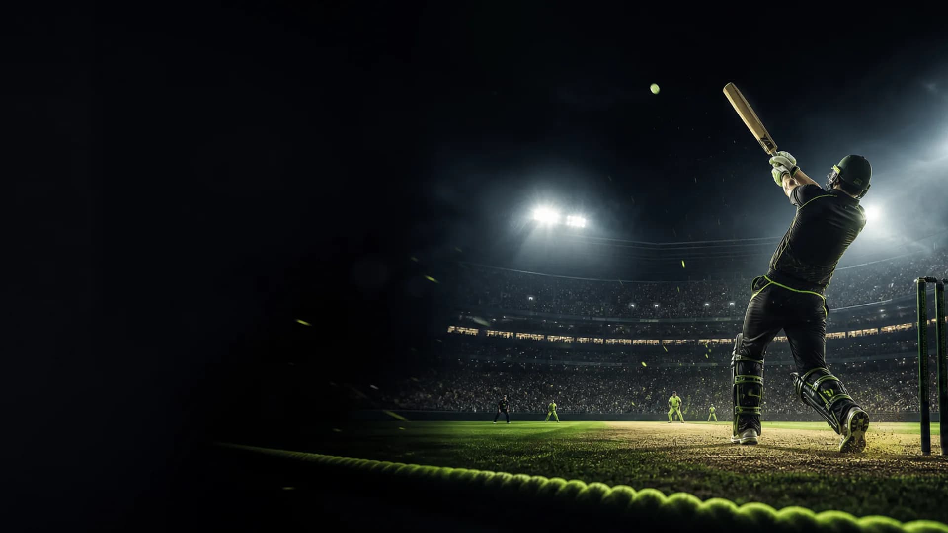Cricket batter playing under stadium lights
